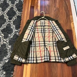 100% Authentic Burberry quilted coat olive green size large. VERY gently used.